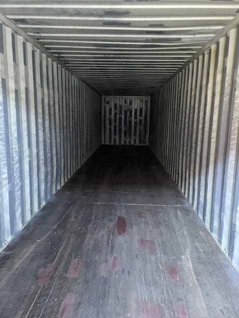 Interior of a 40 ft High Cube used shipping container with wood flooring